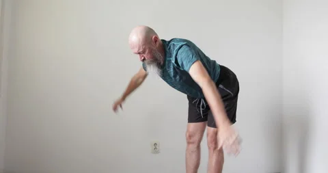 Physio therapy, man doing upper spine and neck exercises Stock Footage 240935384