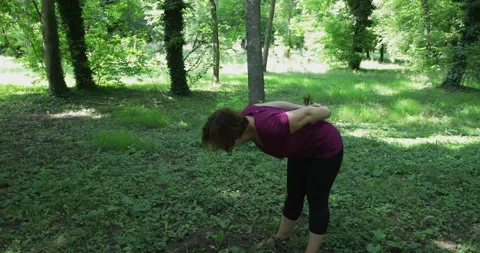 Physio therapy, woman doing upper spine and neck exercises Stock Footage 244376689