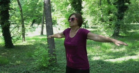 Physio therapy, woman doing upper spine and neck exercises Stock Footage 244376715