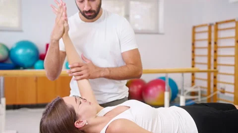 Physio treatment - elbow extension exercises Stock Footage 161636850