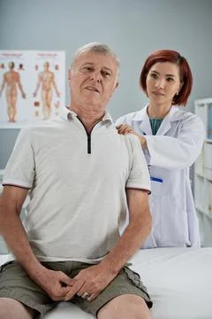 Physiotherapist Massaging Trigger Points Stock Photos