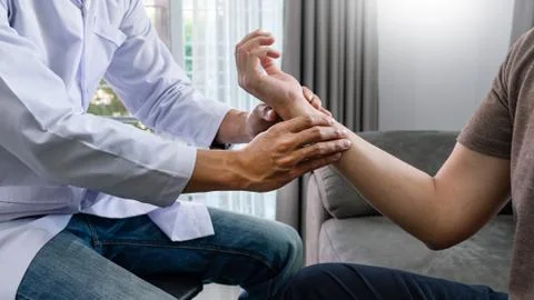 Physiotherapist working with patient doing with exercise, physical therapy co Stock Photos