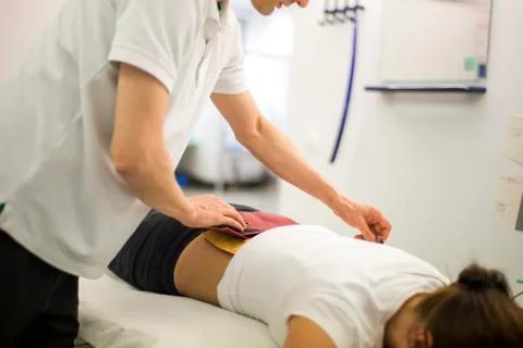 Physiotherapy back warm pads therapy backbone Stock Photos