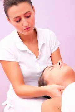 Physiotherapy cervical massage Stock Photos
