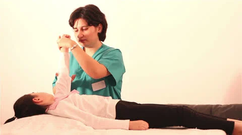 Physiotherapy for children with problems at hand Stock Footage 24668226