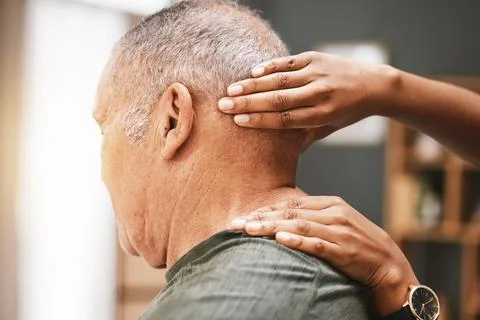 Physiotherapy, neck pain and senior man with physiotherapist for massage, injury Stock Photos