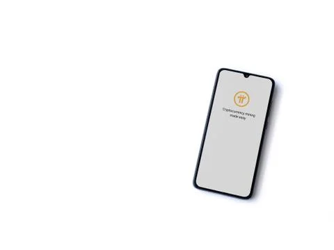 Pi Network app launch screen with logo on the display of a black mobile smart Stock Photos