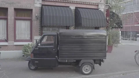 Piaggio Ape 50 three wheel van in Amsterdam Stock-Footage 138022448