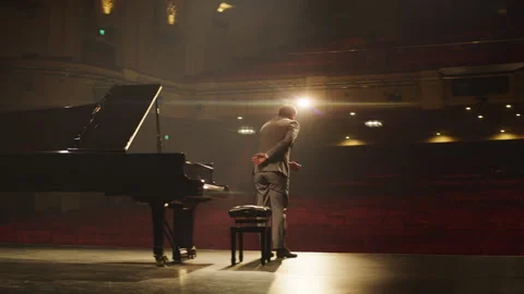 Pianist bows to the audience after the performance Stock Footage 264552387
