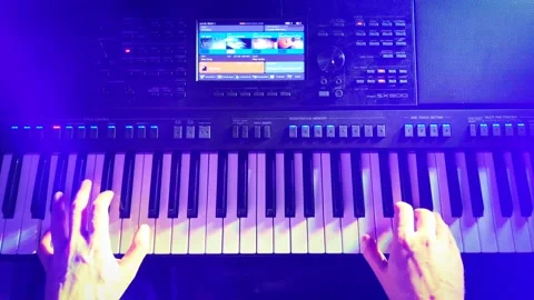 Pianist hands while playing from top view Stock Footage 146087777