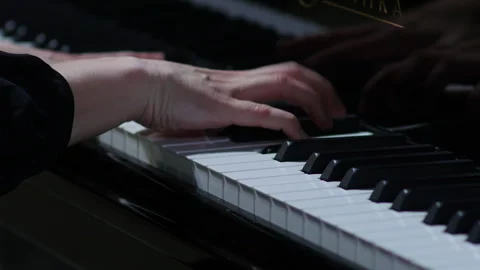 Pianist performing in orchestra. Close up hands of pianist playing.  Stock Footage 277826551