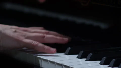 Pianist performing in orchestra. Close up hands of pianist playing.  Stock Footage 277826812
