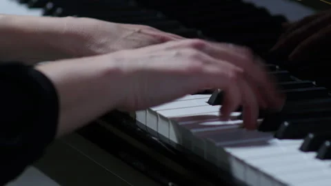 Pianist performing in orchestra. Close up hands of pianist playing.  Stock Footage 277826913