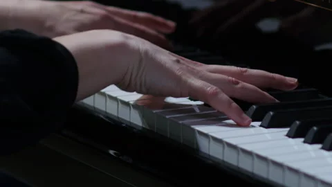 Pianist performing in orchestra. Close up hands of pianist playing.  Stock Footage 277827042