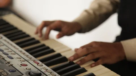 A Pianist playing an Electronic Keyboard. Stock-Footage 112965653
