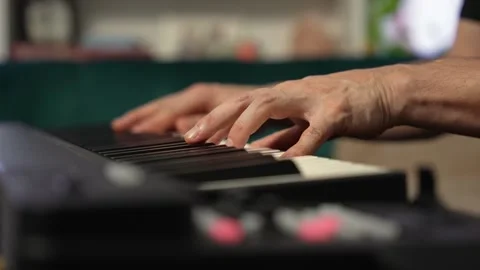 Pianist playing keyboard Stock Footage 147692995
