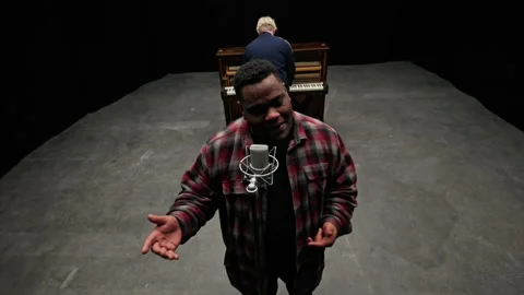 Pianist Playing With A Singer Inside A Studio Stock Footage 236512592