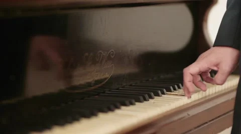 Pianist who exercise a few notes on a austrian piano - 87 Stock Footage 57691996