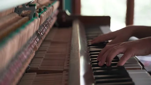 Pianist's hands playing an opened piano Stock Footage 139093657