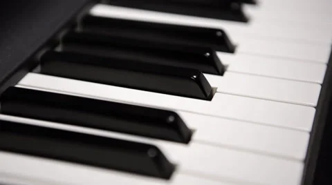 Piano angle shiny moving across keys angle Stock Footage 36738015