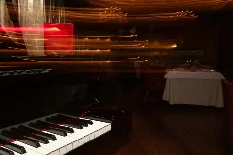 Piano on blurred background Stock Photos