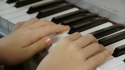 Piano close up played by boy Stock Footage 45621255