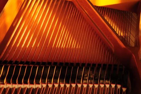 Piano dampers with strings. Stock Photos
