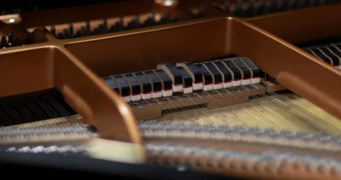 Piano hammers striking the strings Stock Footage 108320795