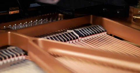 Piano hammers striking the strings Stock Footage 108320883