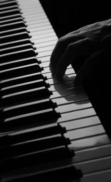 Piano with hand Stock Photos