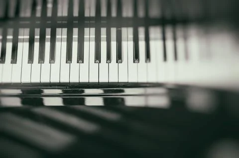 Piano keyboard background with selective focus. Blur keyboard and musical notes Stock-Fotos