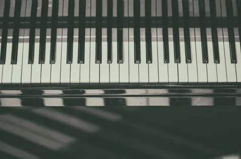 Piano keyboard background with selective focus. Blur keyboard and musical notes 写真素材