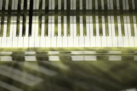 Piano keyboard background with selective focus. Blur keyboard and musical notes Stock Photos