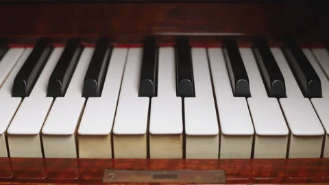 Piano keyboard close up. Elements of musical instrument. Lines and black and Stock Footage 182975296