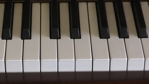 Piano keyboard tracking shot Stock Footage 72345754
