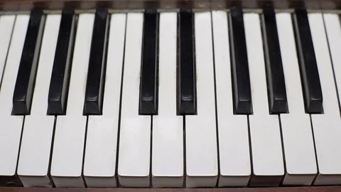 Piano Keys close up keyboard tracking shot full length Stock Footage 81110621