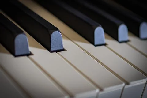 Piano keys close up, selective focus Stock Photos