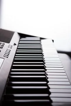 Piano keys on white Foto stock