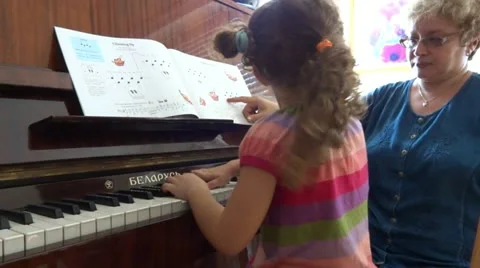 Piano lesson Stock-Footage 12189491