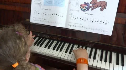 Piano lesson with keyboard Stock Footage 12189188