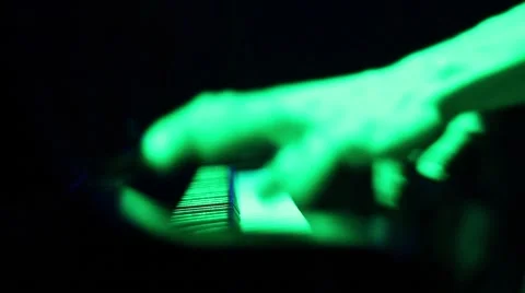 Piano player playing energetically with lights 스톡 동영상 47990840
