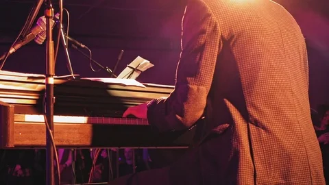 Piano player on the stage Stock Footage 73392476
