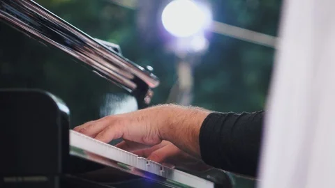 Piano playing. Close-up. Musical theme. Concert program. 動画素材 112425832