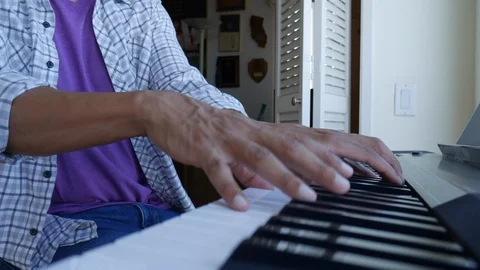 Piano playing Stock Footage 113789797