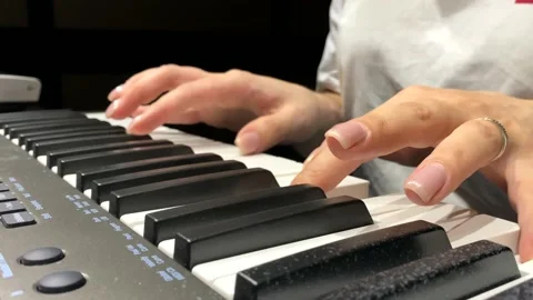 Piano playing Stock Footage 221757240
