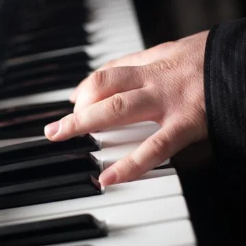 Piano playing Stock Photos