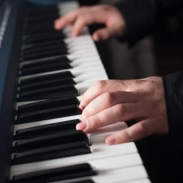 Piano playing Stock Photos