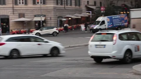 Piazza di barberini pan right to left with traffic cars vehicles during day rome Stock Footage 252147671