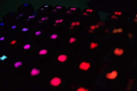 Pic two, black keyboard colorful lights pattern with glow knob Stock Photos