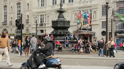 Picadilly Square crowd of people milling about Stock Footage 11128435